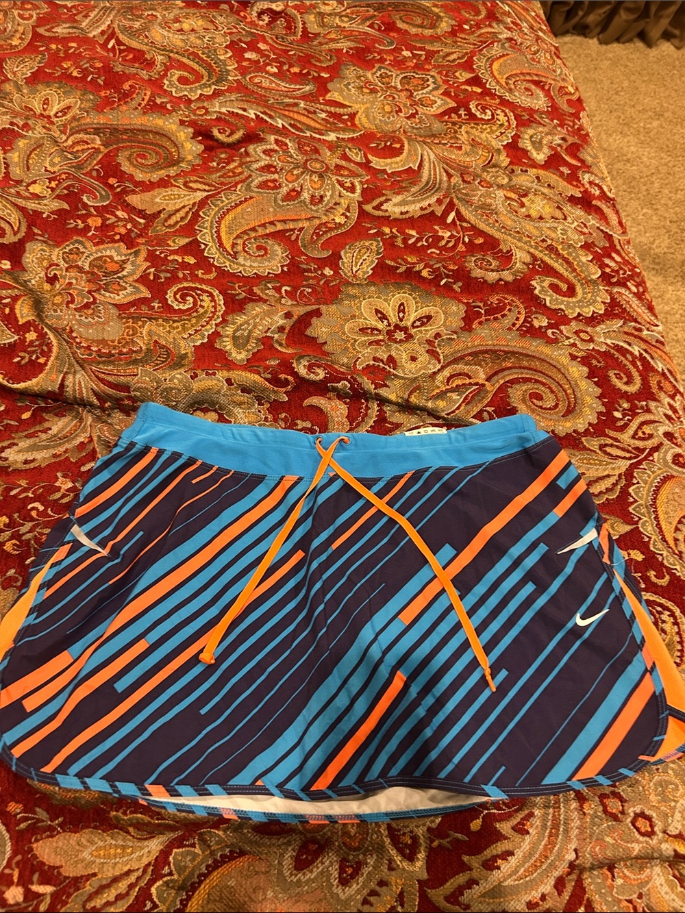 Nike Navy Skort with Bright Blue and Orange Stripes